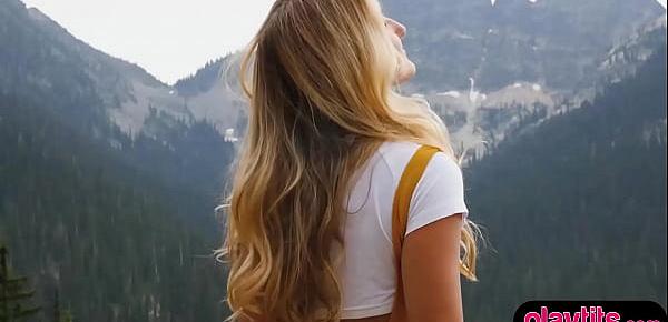  Beautiful blonde babe outdoor strip at the alps